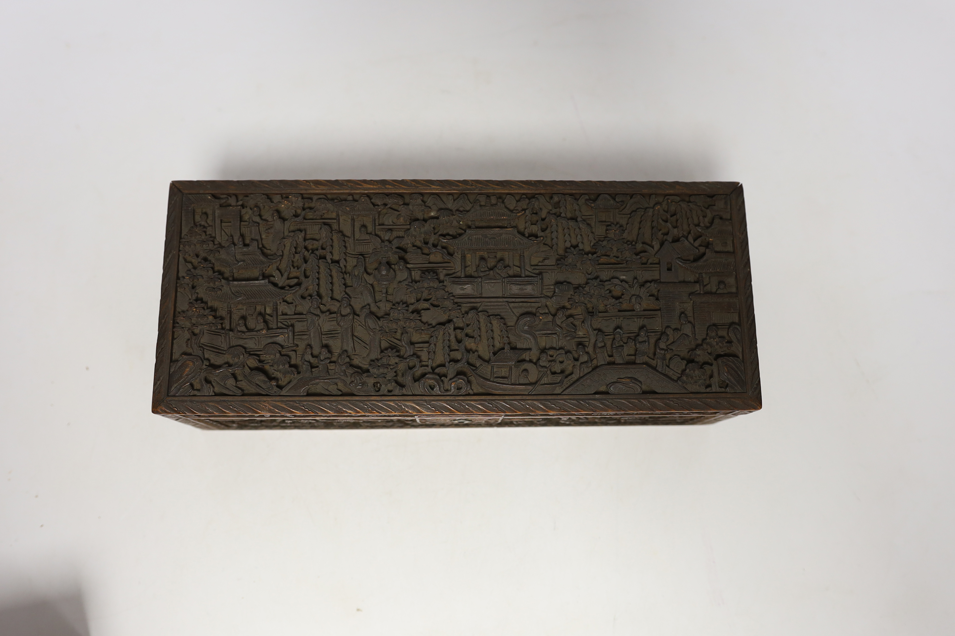 A 19th century Chinese carved boxwood box, an amboyna cigarette box and three others